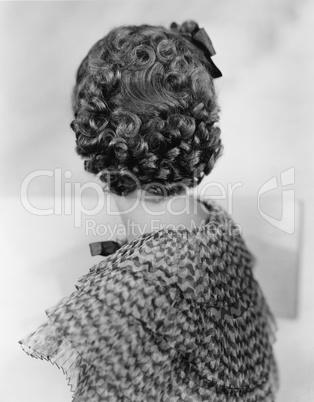 Curly hair on back of womans head