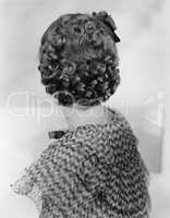 Curly hair on back of womans head