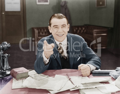 Portrait of happy friendly businessman