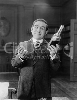 Portrait of happy man having a drink