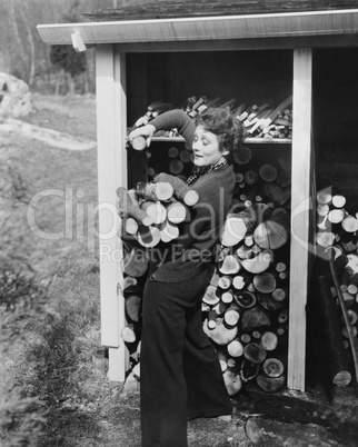 Woman hauling firewood