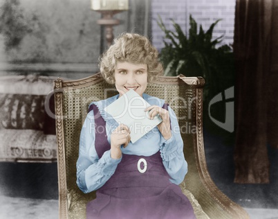 Excited woman with letter