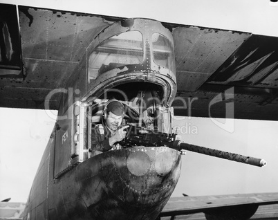 Gunner firing from plane