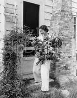 Woman with huge bouquet of flowers