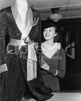 Woman shopping for mans dressing gown