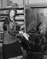 Woman working in print shop