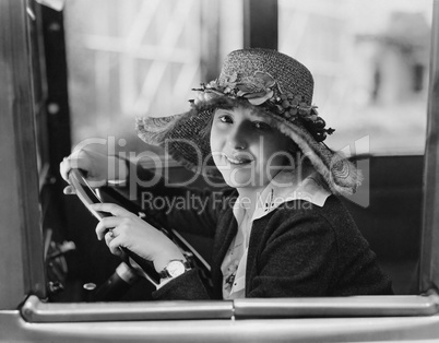Portrait of woman in drivers seat