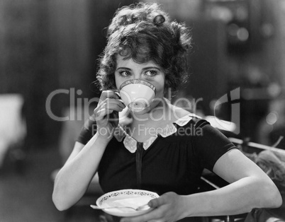 Portrait of woman drinking from teacup