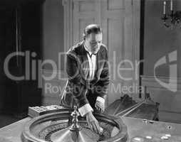 Man with roulette table