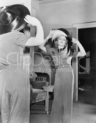 Woman trying on hat