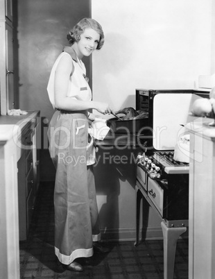 Portrait of woman cooking