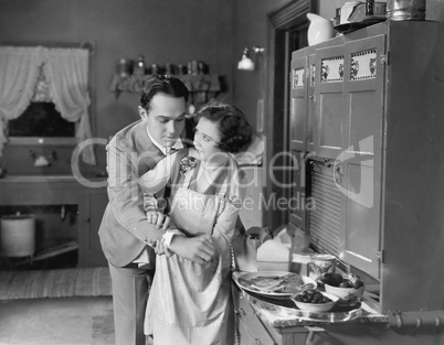 Couple in kitchen