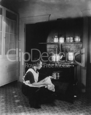 Woman cooking with oven