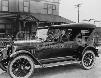 Portrait of man in car