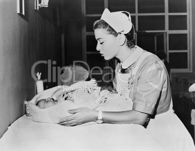Nurse with crying baby