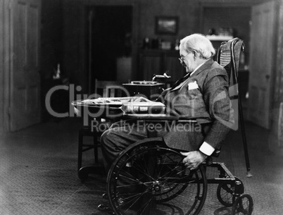 Elderly man in wheelchair