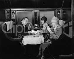 Picking up the tab in train dining car