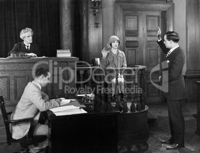 Swearing in witness in courtroom