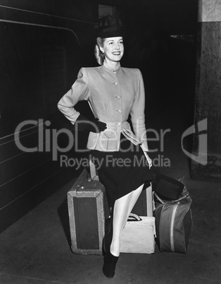 Portrait of woman with luggage