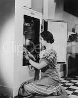 Woman with refrigerator