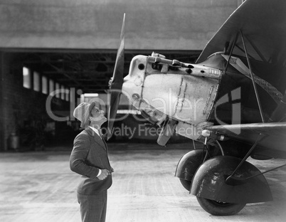 Man admiring plane