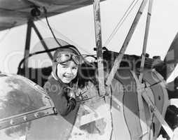 Little boy in cockpit of plane