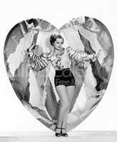 Woman posing with large heart