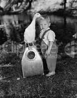 Portrait of toddler with duck