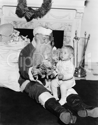 Excited child with Santa Claus