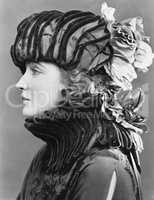 Woman wearing elaborate hat