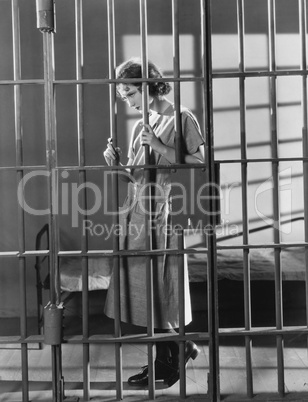 Woman in jail cell