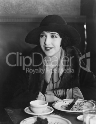 Portrait of smiling woman after meal