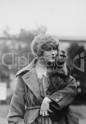 Portrait of woman with monkey