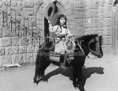 Cowgirl on pony