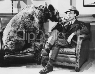 Thoughtful man with bear