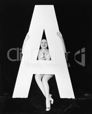 Woman with huge letter A