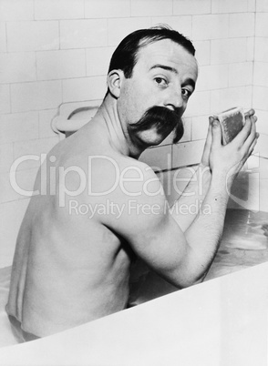 Portrait of man with huge mustache in bath
