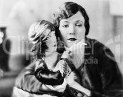 Woman with doll holding cigarette
