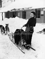 Woman on dogsled