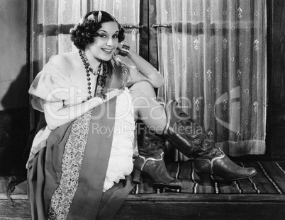 Portrait of woman wearing cowboy boots