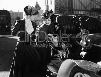 Two women with car