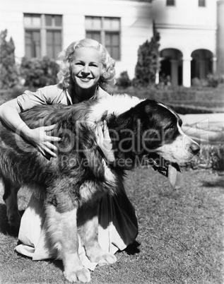 Woman outside with big dog