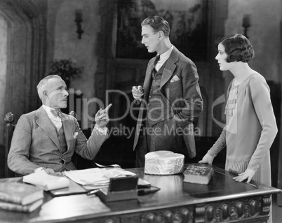 Businessman meeting with man and woman