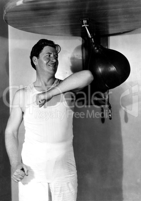 Man using punching bag