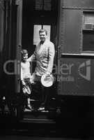 Man and son on train