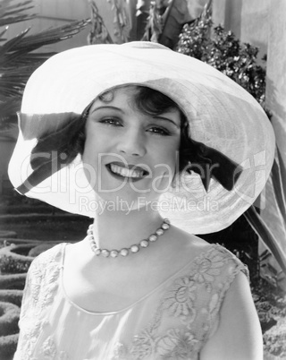 Portrait of woman wearing sunhat