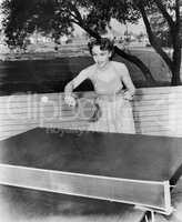Young woman playing table tennis