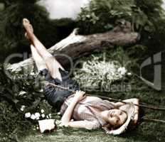 Woman lying on the ground and smiling