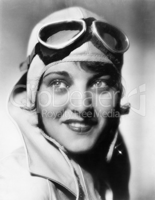 Woman with a pilots hat and goggles