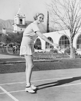 Woman playing badminton